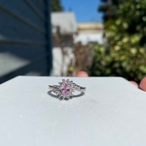 Pink oval diamond ring
